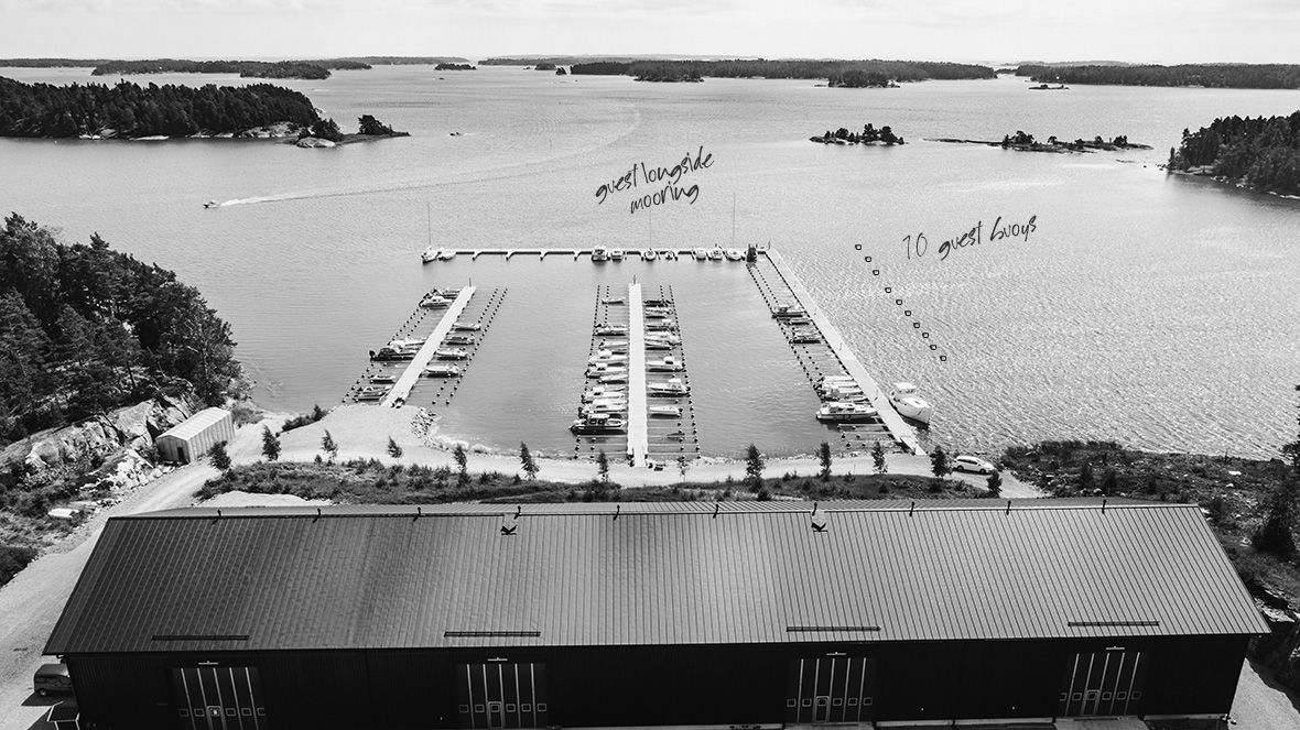 Aerial view of the harbour, berths and storage hall of Baggö Marina